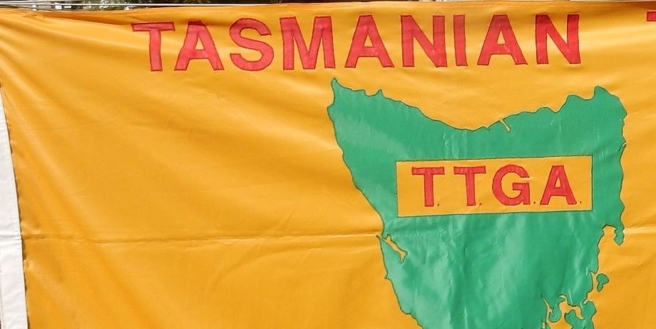 
FIRST TASMANIAN TAXI GOLF ASSOCIATION FLAG WHICH WAS LOST FOR A NUMBER OF YEARS HENCE THE SECOND FLAG. HOWEVER WAS FOUND AND NOW IS OUR MAJOR FLAG.