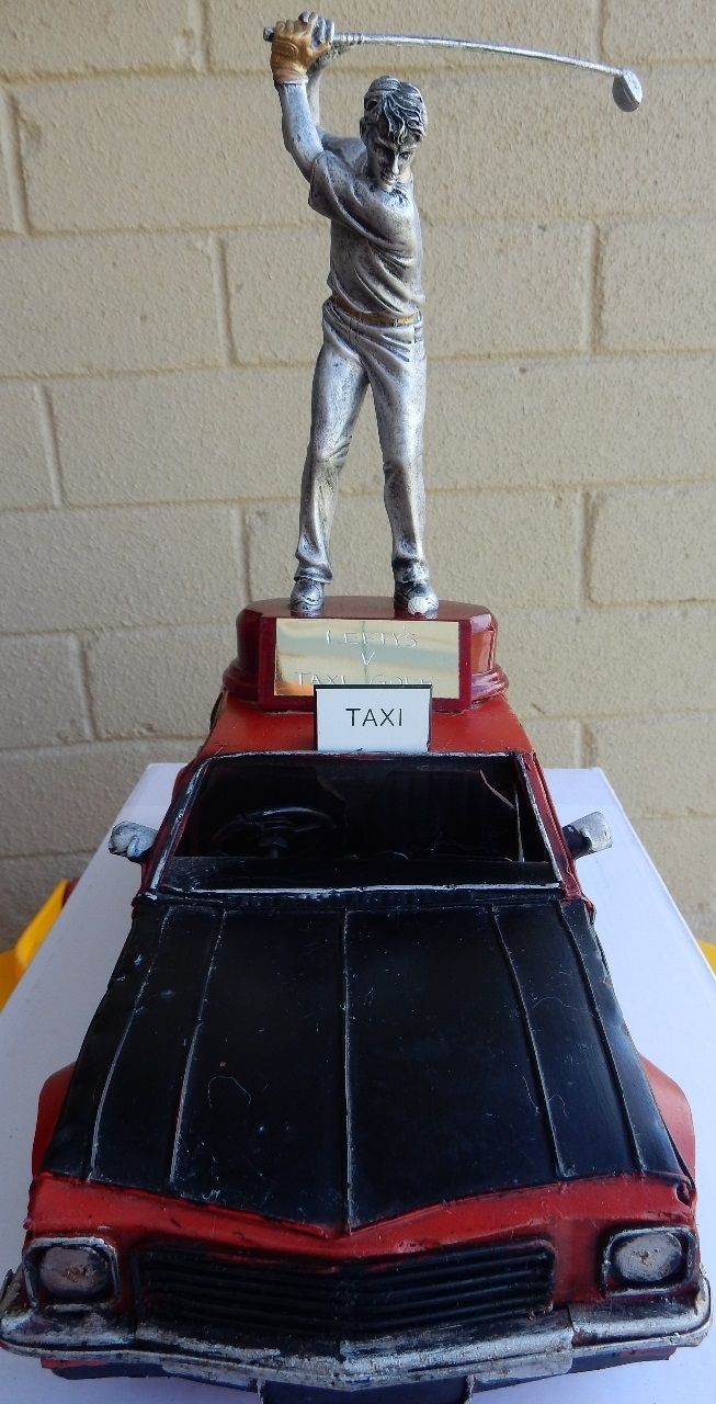 THIS TROPHY WHICH IS FOR THE LEFTIES VERSES THE TAXI GOLF MEMBERS HAS SURFACED IN DECEMBER 2018 AND AS EDITOR I DID NOT IT EVEN IT EXISTED. SHOWING SIGNS OF EXTREME WARE SO INTERESTING TROPHY.